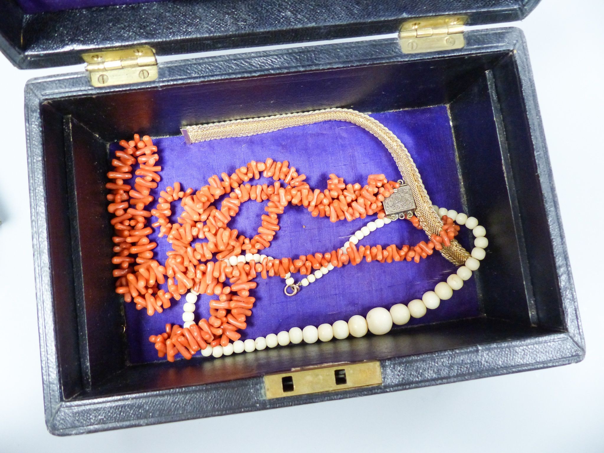 Mixed jewellery including a single strand seed pearl necklace with diamond set clasp, 37cm, a 9ct brooch, gross 2.4 grams, a coral necklace, Scottish hardstone brooch etc.